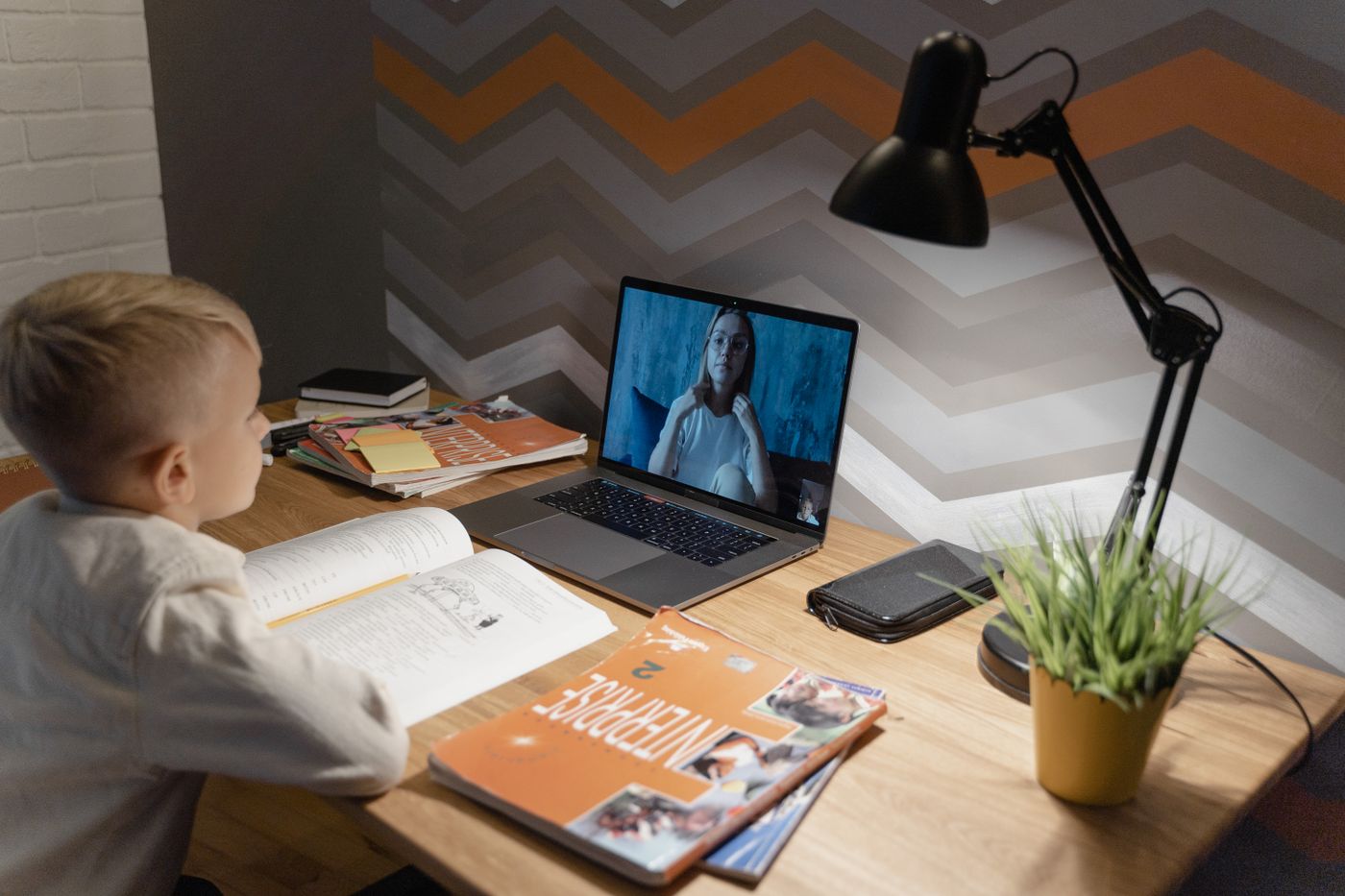 A child in a live 1:1 video class with a teacher